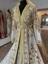 Takchita Ziana taqulidi Mollie